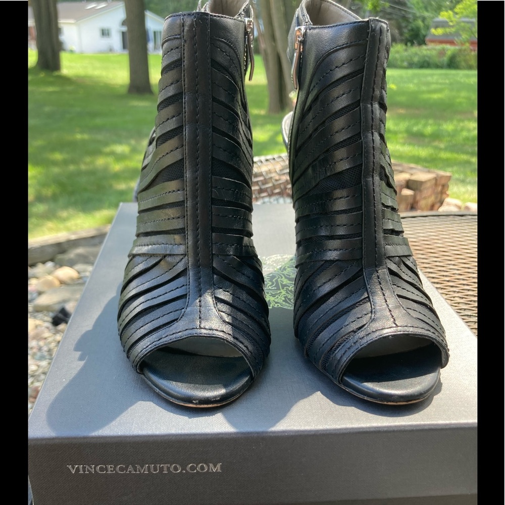 Vince Camuto sandals.                                Black 4”heel silver buckle